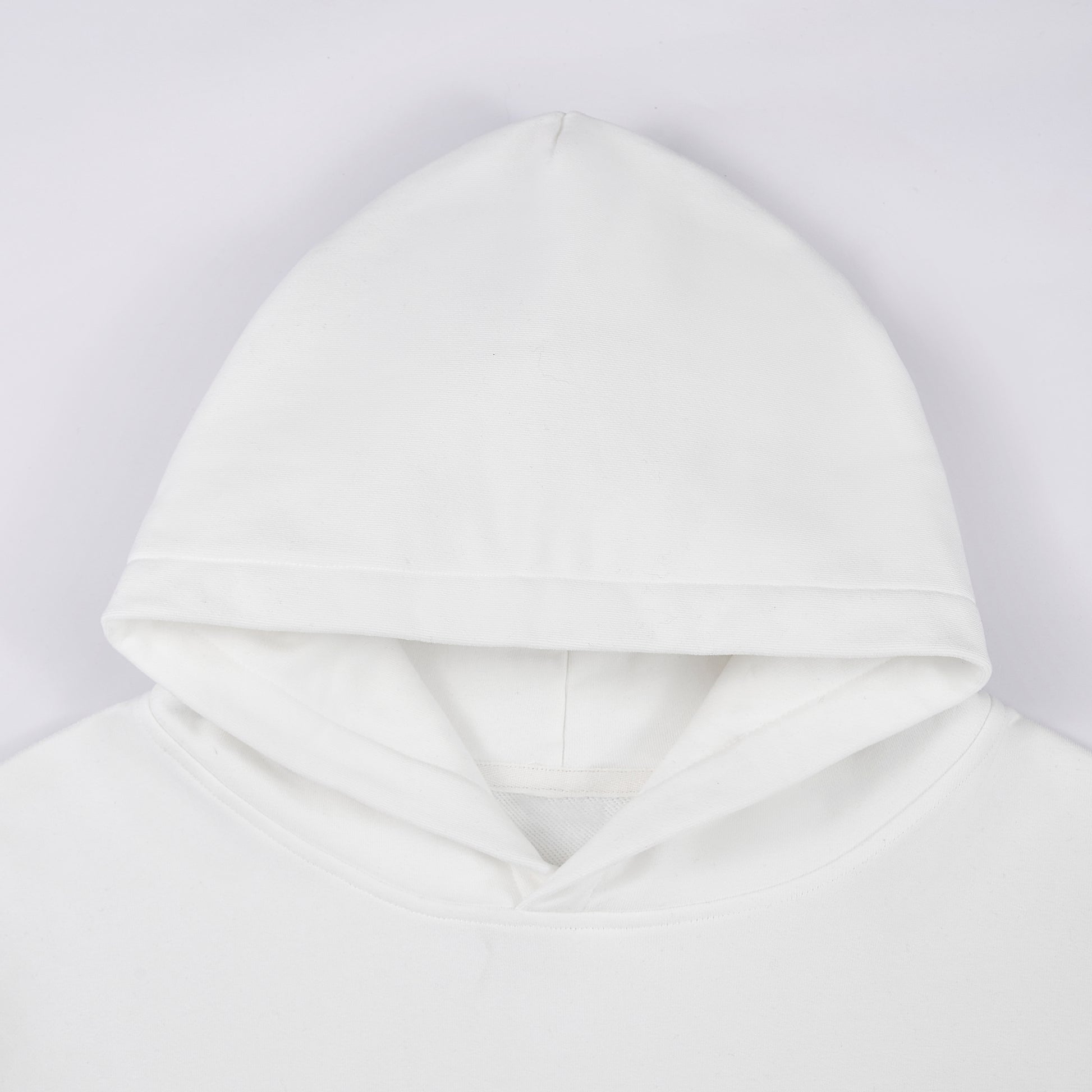 White hoodie on a light gray background