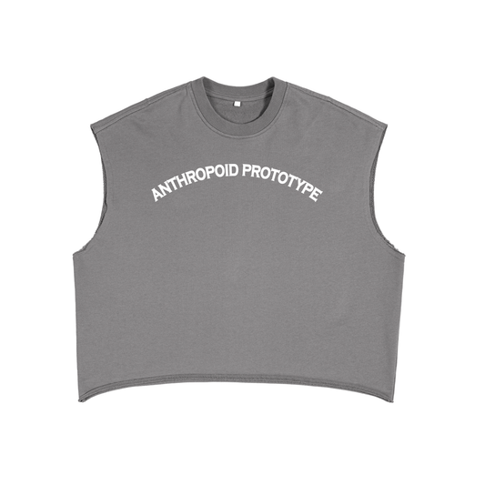 A grey unisex sleeveless tank top displays the white text "ANTHROPOID PROTOTYPE" printed across the chest. It has a round neck.