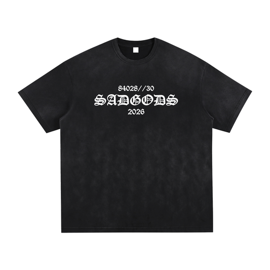 Black t-shirt with white text on a white background