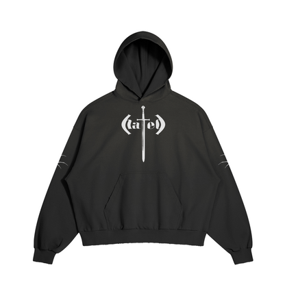 A black hoodie with a distressed vintage wash, featuring a graphic design of the word "Hated" with a sword replacing the "T".