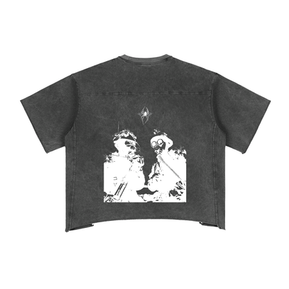 A washed black unisex t-shirt displays a white graphic on the back featuring two figures in gas masks and tactical gear, with a spider graphic above them.