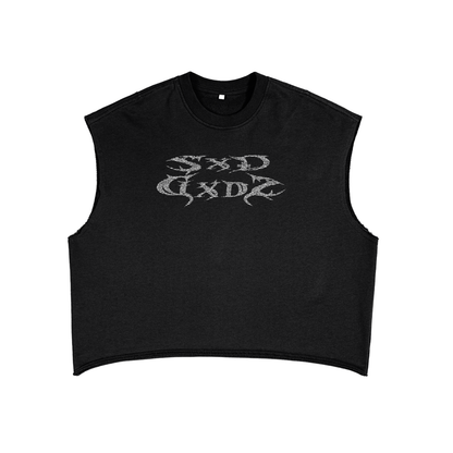 A black, cropped unisex tank top features a stylized, shimmering white graphic on the chest that reads "SXD GXDS" in a gothic-inspired font.