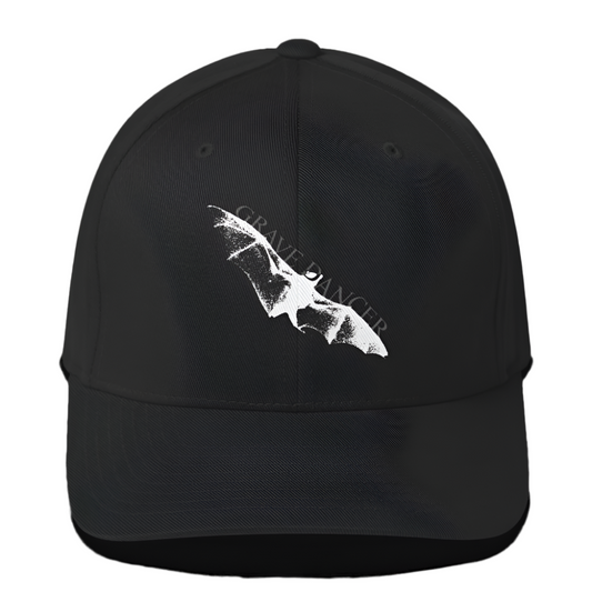 A black baseball cap with a curved visor features a white graphic of a bat wing and the text "GRAVE DANCER" on the front.