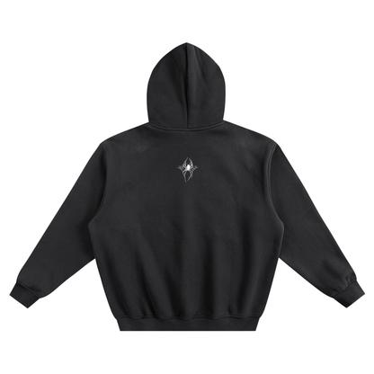 Back view of a black hoodie, featuring a small white spider graphic positioned above a stylized metal logo that reads "SXDGXDS" at the upper back.