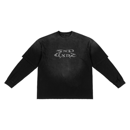 A washed black unisex long-sleeve shirt with a layered effect features a metallic silver abstract graphic on the center of the chest. It has a round neck.