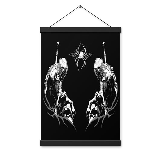 A black matte poster hangs from a natural wood hanger. The poster features a white graphic of two figures in gas masks flanking a spider-like design at the top.