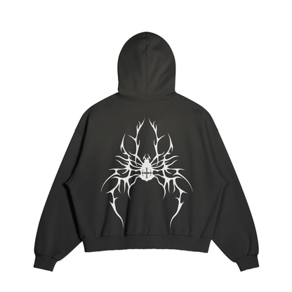 SXDGXDS Widow Hoodie: A black hoodie with a large, stylized spider design printed on the back. Features drop shoulders, a washed effect, a ripped pocket, and a boxy fit. Made of 100% cotton 32 count plain weave, pre-shrunk, and reactive-dyed for long-lasting color. Features side-seamed construction, binding taped neck and shoulders, and double-stitched ribbed cuffs and hem. Fabric weight: 380g/m².